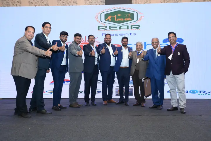 REAR organising team members celebrating together on the Suryasthan 2025 stage